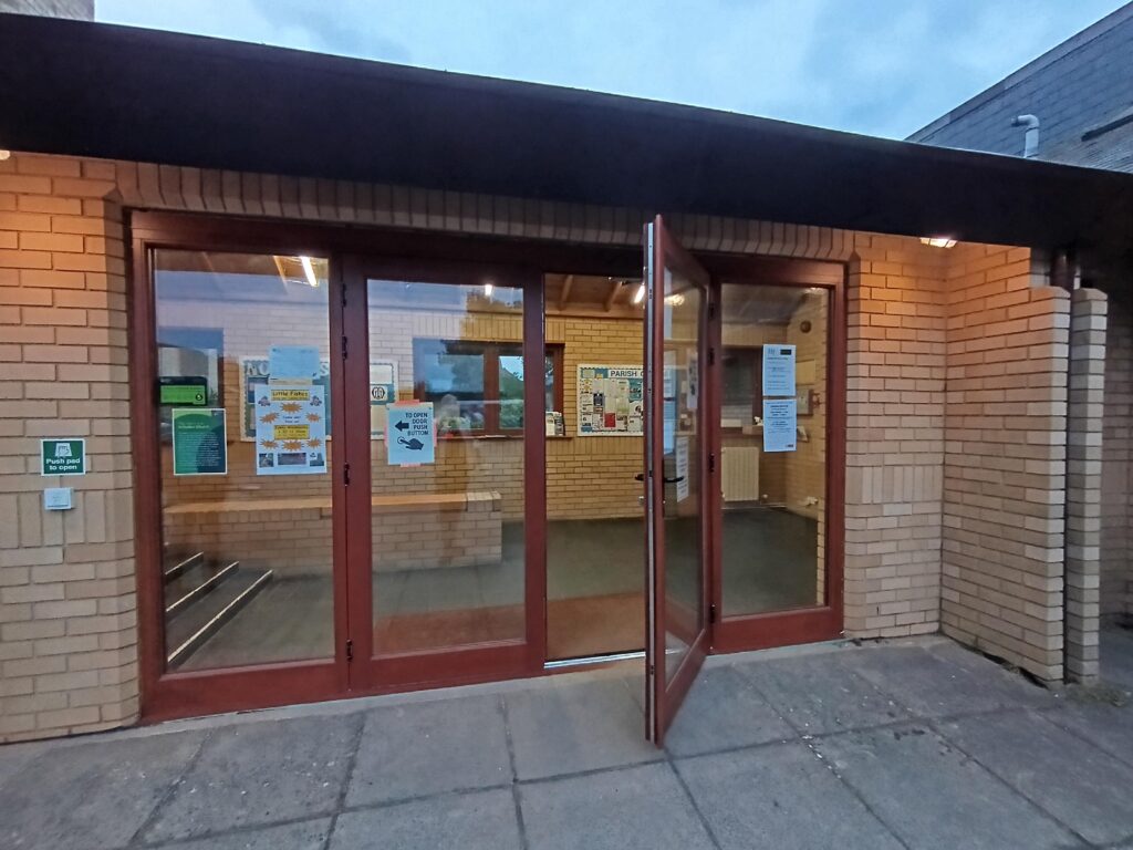 Image shows electronic door open to the Parish Centre.